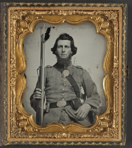 Unidentified soldier in Confederate uniform and Georgia state seal belt buckle with musket. From the Library of Congress Liljenquist Family of Civil War Photographs, AMB/TIN no. 2991 [P&P].